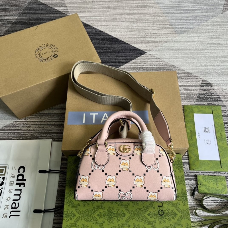 G*u*i top handle bags